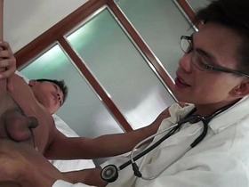 Asian twink gets aroused by medical play