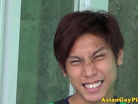 Young Asian twinks engage in watersports and rimming
