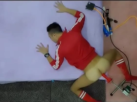 Asian gay fun with a red buttmachine and dildo