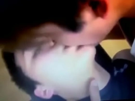 Sensual Asian men engage in passionate lip and ear licking