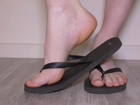 Solo masturbation session ends with a messy footjob